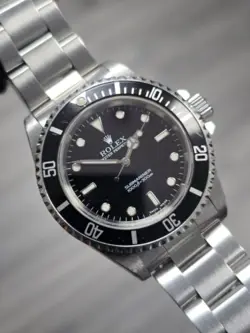 ROLEX SUBMARINER 14060M SILVER OYSTER BRACELET WITH BLACK BEZEL W/ B&P