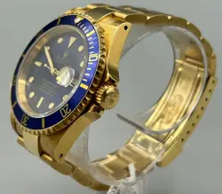 ROLEX SUBMARINER 16618 GOLD OYSTER BRACELET WITH BLUE BEZEL