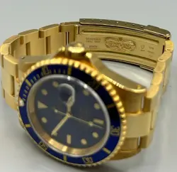 ROLEX SUBMARINER 16618 GOLD OYSTER BRACELET WITH BLUE BEZEL