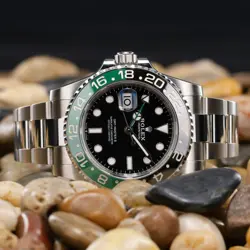 ROLEX GMT-MASTER II SILVER OYSTER BRACELET WITH BLACK AND GREEN BEZEL 126720VTNR
