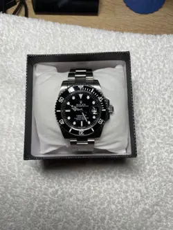 ROLEX SUBMARINER SILVER OYSTER BRACELET WITH BLACK BEZEL
