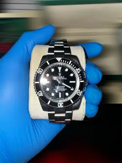 ROLEX SUBMARINER SILVER OYSTER BRACELET WITH BLACK BEZEL