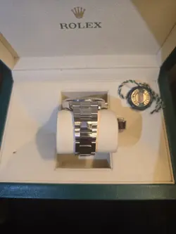 ROLEX DATEJUST 41 BLUE ROMAN DIAL WHITE GOLD FLUTED BEZEL 126334