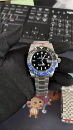 ROLEX GMT MASTER II WITH BOX AND PAPERS