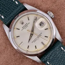 ROLEX OYSTER PERPETUAL DATE 1500 SILVER DIAL WATCH