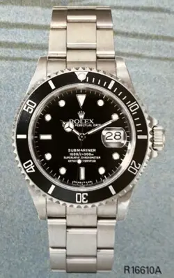 Rolex Submariner R11610A w/calendar black dial boxes certificate, all booklets.