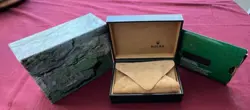 Rolex Submariner R11610A w/calendar black dial boxes certificate, all booklets.