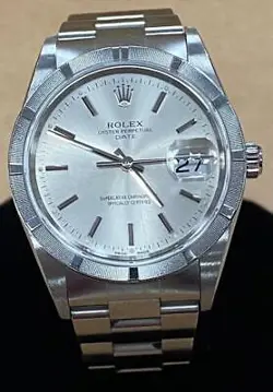 ROLEX OYSTER PERPETUAL DATE SILVER DIAL STAINLESS STEEL 34MM AUTOMATIC WATCH.