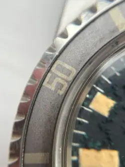 7016/0
