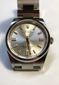 2024 ROLEX OYSTER PERPETUAL 126000 SILVER DIAL 36 MM MINT CONDITION FULL SET