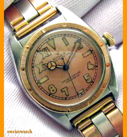 GOLD BEZEL W/RIVETS