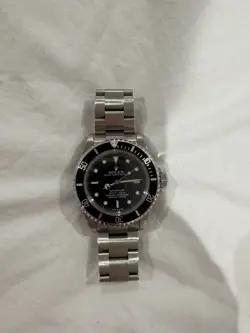 ROLEX SEA-DWELLER SILVER OYSTER BRACELET WITH BLACK BEZEL