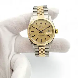 Men's Rolex 34mm Date 18K Gold / Steel Watch with Gold Dial and Fluted Bezel.