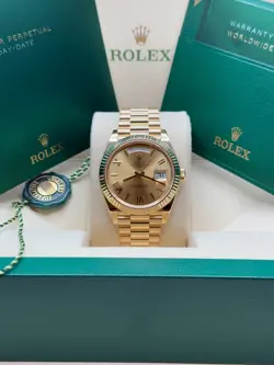 ROLEX DAY-DATE 40 YELLOW GOLD CHAMPAGNE ROMAN DIAL FLUTED BEZEL PRESIDENT