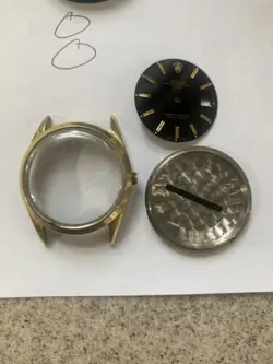 ROLEX 1550 14K GOLD SHELL CASE AND BLACK DIAL