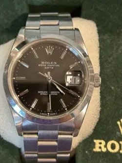 Rolex Date 15200- Black Dial W/ Oyster Bracelet & Silver Bezel, W/ Box & Papers!
