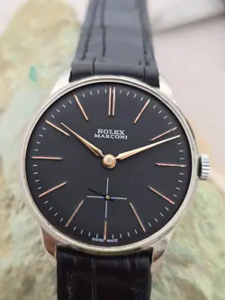 ROLEX MARCONI JUNIOR A CUERDA DIAL RESTAURADO COLOR NEGRO CAJA  NICKEL