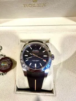ROLEX MILGAUSS 116400 BLACK DIAL  BOX AND PAPERS.