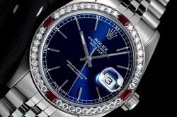 ROLEX DATEJUST 31 MM BLUE INDEX DIAL DIAMOND & RUBY BEZEL STEEL LADIES WATCH