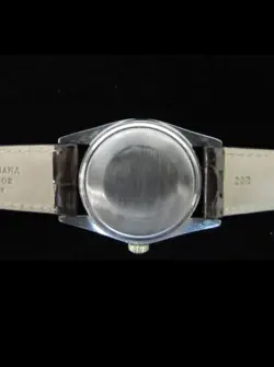 Rolex Datejust 1601 18kt Gold Bezel And Stainless Steel Circa 1974