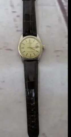 Rolex Datejust 1601 18kt Gold Bezel And Stainless Steel Circa 1974