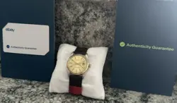 Rolex Datejust 1601 18kt Gold Bezel And Stainless Steel Circa 1974