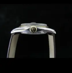 Rolex Datejust 1601 18kt Gold Bezel And Stainless Steel Circa 1974