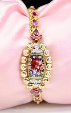 VINTAGE ROLEX 14K YELLOW GOLD WATCH WITH DIAMONDS, RUBIES