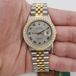 W/DIAMOND BEZEL.