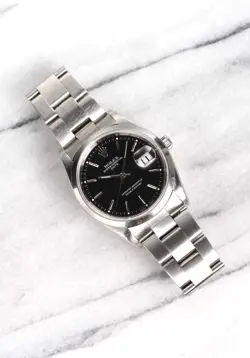 Rolex Oyster Perpetual Date Ref 15200 90s Black Dial 34mm Case.