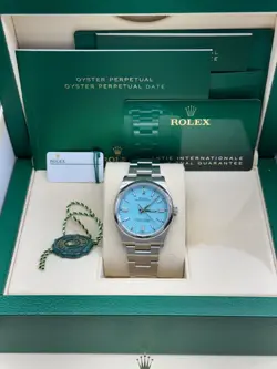 2024 ROLEX OYSTER PERPETUAL 36MM (REF: 126000) TURQUOISE DIAL BOX & PAPERS