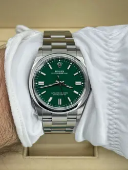 Mint Rolex Oyster Perpetual 36mm, Green, 126000, dated 2023