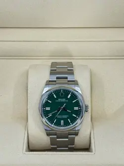 Mint Rolex Oyster Perpetual 36mm, Green, 126000, dated 2023