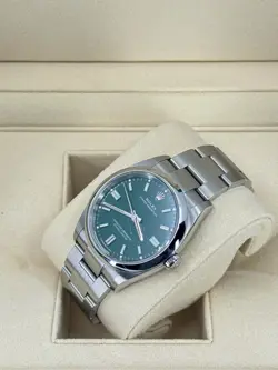 Mint Rolex Oyster Perpetual 36mm, Green, 126000, dated 2023