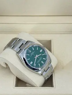 Mint Rolex Oyster Perpetual 36mm, Green, 126000, dated 2023