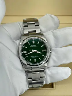 Mint Rolex Oyster Perpetual 36mm, Green, 126000, dated 2023