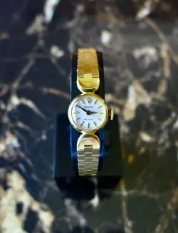 A BEAUTIFUL VINTAGE 1960s LADIES ROLEX COCKTAIL WATCH 18K YELLOW GOLD