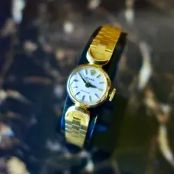 A BEAUTIFUL VINTAGE 1960s LADIES ROLEX COCKTAIL WATCH 18K YELLOW GOLD