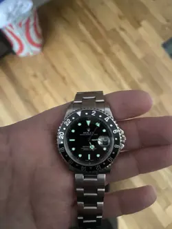 ROLEX GMT-MASTER II 16710 SILVER OYSTER BRACELET WITH BLACK BEZEL