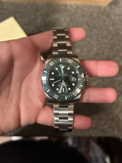 ROLEX SUBMARINER  SILVER OYSTER BRACELET WITH GREEN BEZEL
