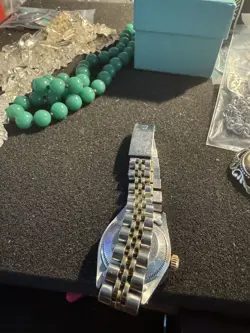 One Ladies Rolex WW Stainless Steel 18KTYG Oyster Perpetual Channel in Diamonds