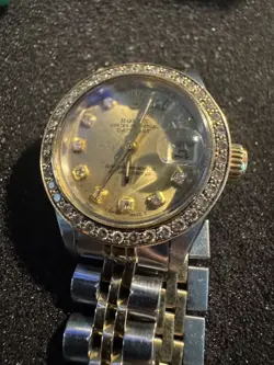 One Ladies Rolex WW Stainless Steel 18KTYG Oyster Perpetual Channel in Diamonds