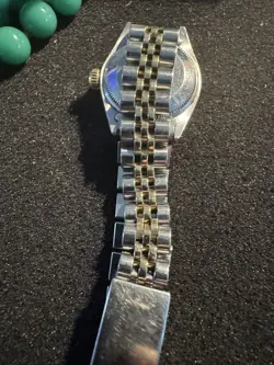 One Ladies Rolex WW Stainless Steel 18KTYG Oyster Perpetual Channel in Diamonds