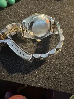 One Ladies Rolex WW Stainless Steel 18KTYG Oyster Perpetual Channel in Diamonds