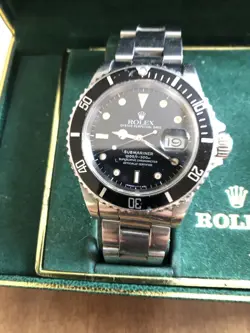 ROLEX SUBMARINER 168000 SILVER OYSTER BRACELET WITH BLACK BEZEL