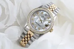 ROLEX DATEJUST 31 MM WHITE MOTHER OF PEARL DIAL TWO TONE DIAMOND WATCH