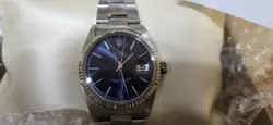 ROLEX MENS DATEJUST BLUE ROMAN DIAL 18K WHITE GOLD AND STEEL WATCH 36MM