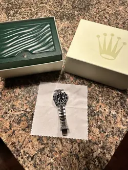 ROLEX GMT-MASTER II 116710  SILVER OYSTER BRACELET WITH BLACK BEZEL