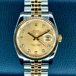 ROLEX DATEJUST 36 TWO-TONE CHAMPAGNE DIAMOND FLUTED BEZEL SUPER JUBILEE 116233