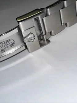 77210